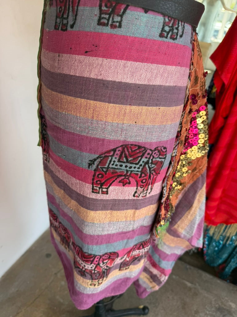 Plum sarong detail showing sequin loss typical of vintage textile