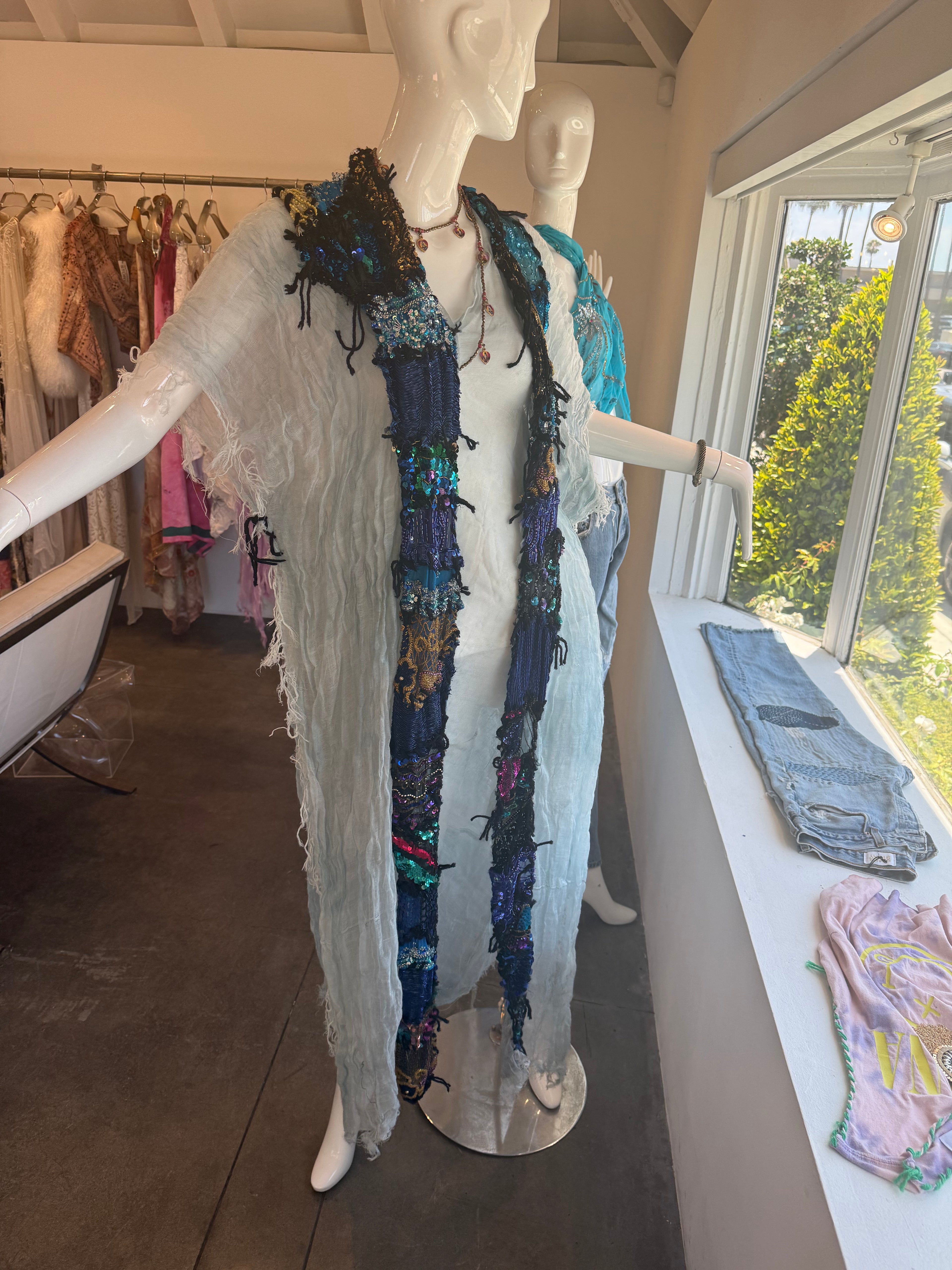 The Wanderer dress styled on model at the beach
